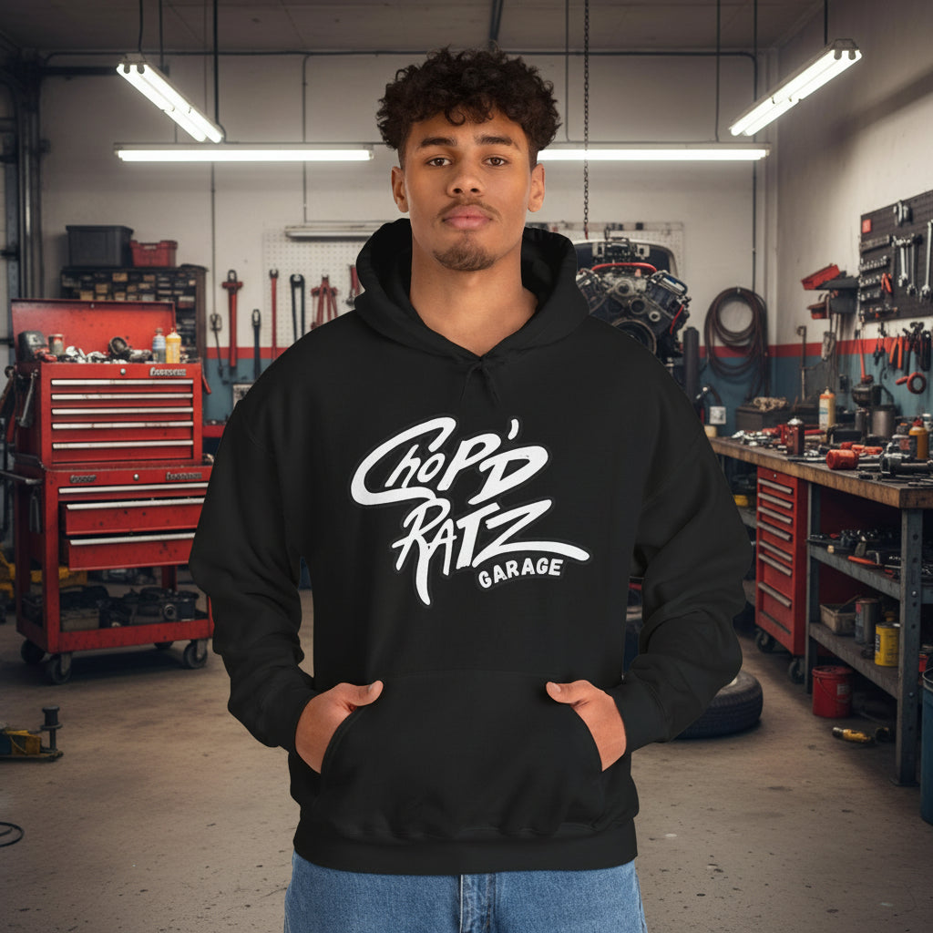 Person wearing a black hoodie with 'Chop'D Ratz Garage' text