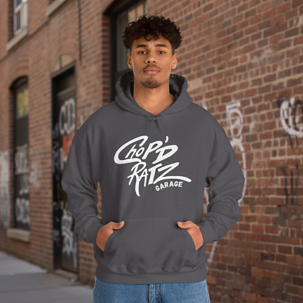 Person wearing a gray hoodie with 'Chop'd Ratz Garage' text