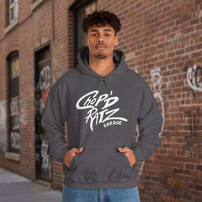 Person wearing a gray hoodie with 'Chop'd Ratz Garage' text